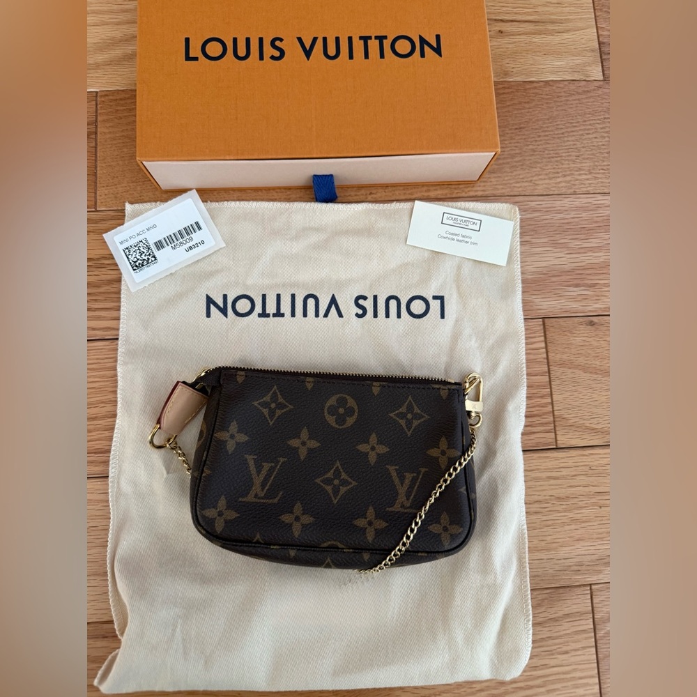 NWT Louis Vuitton Monogram Mini Pochette with Gold Chain